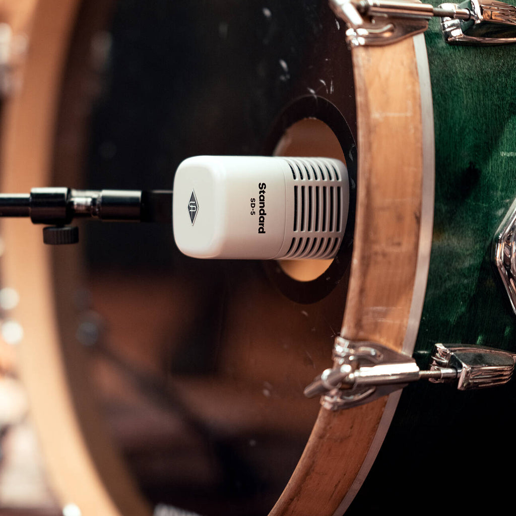Universal Audio SD-5 dynamic microphone with black grille and body, designed for studio and live sound applications.