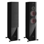 Pair of DALI Rubikore 6 black passive floorstanding speakers with sleek design and modern speaker grille.