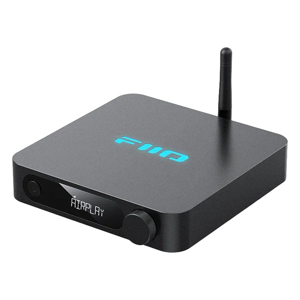 FiiO SR11 Wi-Fi AirPlay music streamer connected to audio system, compact device for high-quality wireless audio streaming.