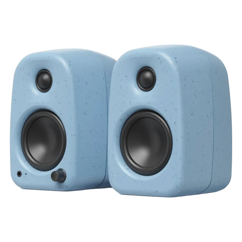 Kanto Audio UKI desktop speakers with black rectangular cabinets and front-facing speaker drivers, positioned side by side.