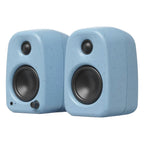 Kanto Audio UKI desktop speakers with black rectangular cabinets and front-facing speaker drivers, positioned side by side.