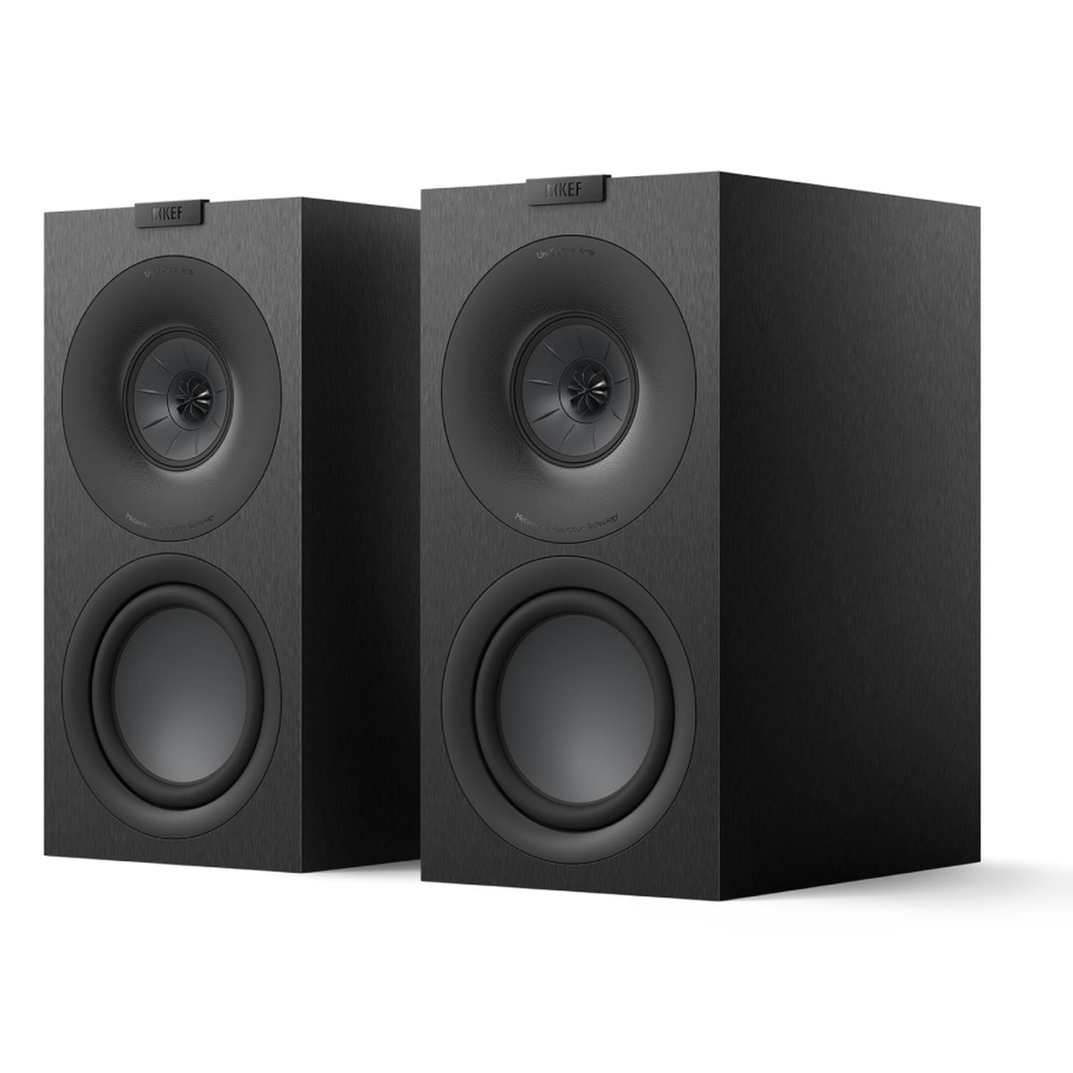 Pair of KEF Q Concerto Meta passive bookshelf speakers with sleek black cabinets and detailed driver grilles, ideal for home audio.