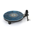 Rega Replay turntable with a record on the platter