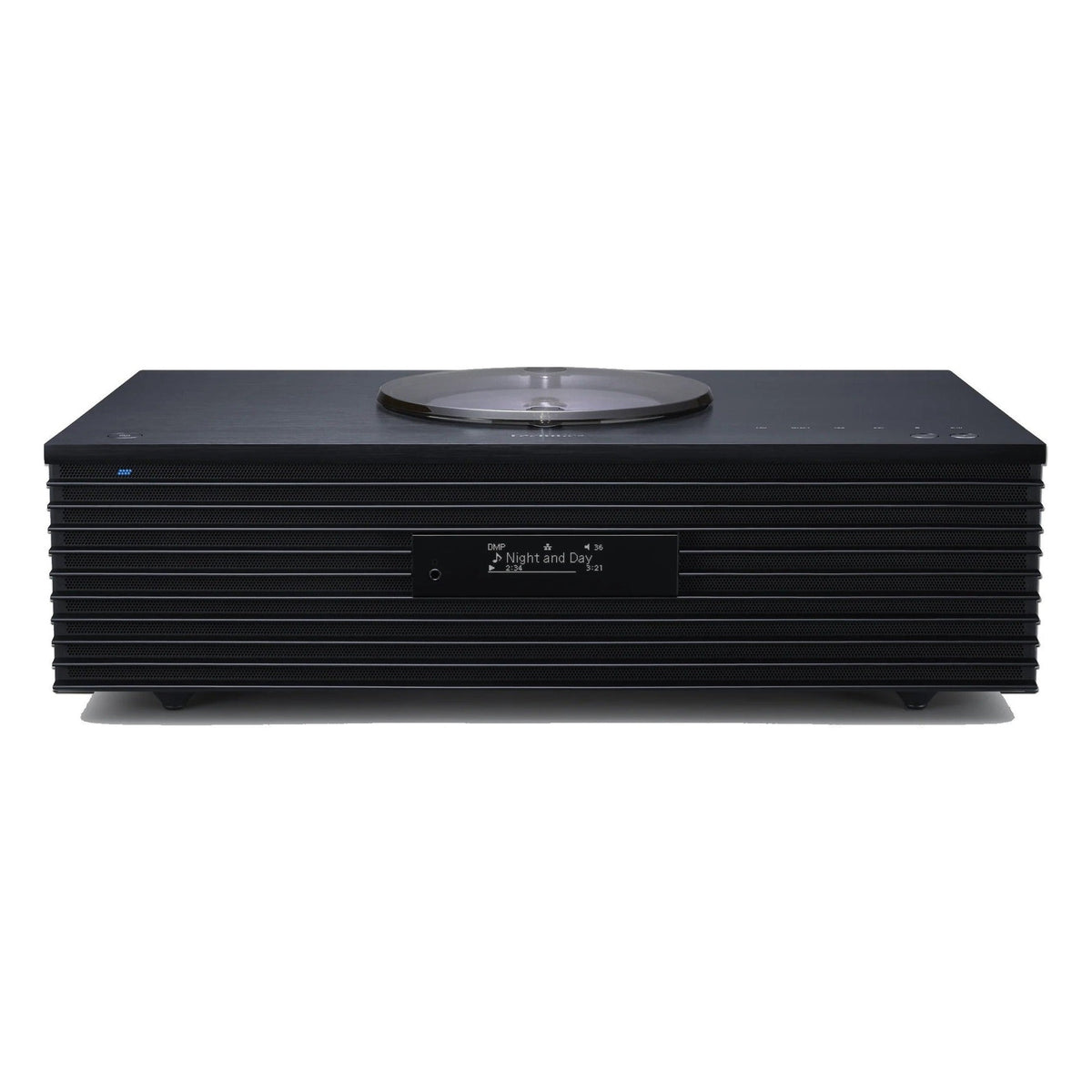 Technics SC-C70MK2 CD player with sleek design, digital display, and control buttons on top, in a modern home audio setup.