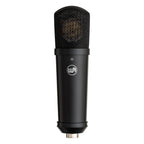 Warm Audio WA-87jr SE condenser microphone in black, front view showcasing its compact design and professional-grade build.